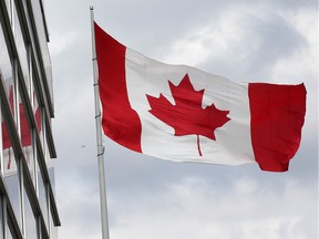 The Great Canadian flag flies in downtown Windsor on Wednesday, March 24, 2021, after being tucked away for the winter.