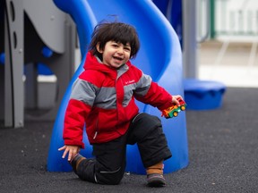 Omar Al Haddad, age 3, has fun at the newly-built Legacy Park playground at Windsor's waterfront on Wednesday, Dec. 14, 2022.
