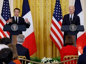 U.S. President Joe Biden and French President Emmanuel Macron hold a joint press conference in the East Room of the White House in Washington, D.C., on Dec. 1, 2022.