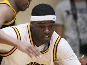 Malique Calloo of Windsor during a high school basketball game in 2015.