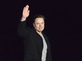 SpaceX's Elon Musk waves while providing an update on Starship, near Brownsville, Texas, Feb. 10, 2022. Twitter on Thursday, Dec. 15, 2022, suspended the accounts of multiple journalists who cover the social media platform and Musk, including reporters working for The New York Times, Washington Post, CNN and other publications.