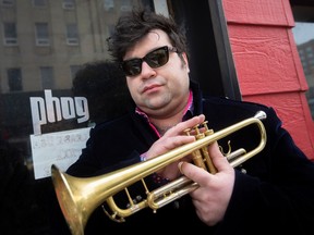 Local jazz musician, Russ Macklem, is pictured outside Phog Lounge where musicians from Detroit, Toronto, and New York City will join Macklem to record a live jazz album, on Wednesday, Dec. 28, 2022.