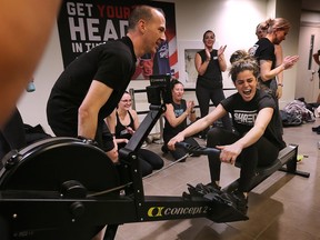 Amanda Shemoun from the Shred Shop gym gives it her all during the Crews N Brews Rowing Vs Cancer event on Sunday, December 4, 2022 at the WFCU Centre in Windsor.