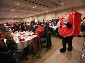 Mascots greet the crowd at the Salvation Army Windsor Centre of Hope annual Christmas dinner event on Wednesday, December 14, 2022 at the St. Clair College Centre for the Arts.