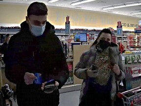 Essex County OPP are asking for the public's help identifying two suspects accused of stealing from a business on Main Street East in Kingsville on Dec. 7, 2022.