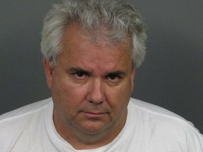 Dennis Montgomery is seen in a mugshot taken after his arrest on July 16, 2009 by the Riverside County Sheriff's Department in Riverside, California, U.S., in this handout picture.