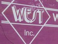 Logo of Women's Enterprise Skills Training of Windsor outside the organization's office on Ouellette Avenue.