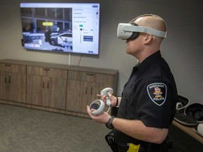 Constant Windsor Police Officer Nick Long demonstrates the service's new virtual reality mental health crisis response training. Taken December 14, 2022.