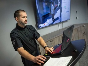 Adam Karpenko, an instructor at the Constant Windsor Police Training Branch, oversees the service's new virtual reality mental health crisis response training program. Taken December 14, 2022.