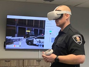 Constant Windsor Police Officer Nick Long practices his de-escalation skills in a VR environment. Taken December 14, 2022.