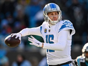 Jared Goff of the Detroit Lions throws a pass against the Carolina Panthers during the first half of the game at Bank of America Stadium on December 24, 2022 in Charlotte, North Carolina.