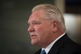 Ontario Premier Doug Ford answers questions following a press conference at a Shoppers Drug Mart pharmacy in Etobicoke, Ont., on Wednesday, Jan. 11, 2023.