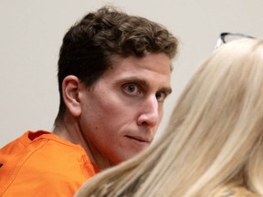Bryan Kohberger, left, who is accused of killing four University of Idaho students in November 2022, looks toward his attorney, public defender Anne Taylor, right, during a hearing in Latah County District Court, Thursday, Jan. 5, 2023, in Moscow, Idaho.