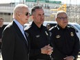 U.S. President Joe Biden, left, speaks with U.S. Customs and Border Protection police on the Bridge of the Americas border crossing between Mexico and the U.S. in El Paso, Texas, Sunday, Jan. 8, 2023.
