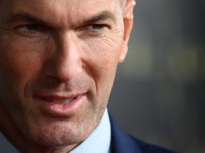 In this file photo taken on October 17, 2022 French former forward football player Zinedine Zidane poses upon arrival to attend the 2022 Ballon d'Or France Football award ceremony at the Theatre du Chatelet in Paris.
