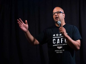 Canadian stand-up comedian Ali Hassan on stage in Toronto in 2017.
