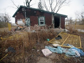An abandoned burnt-out house at 3821 King Street in Windsor is shown on Thursday, January 12, 2023. A developer wanted to replace it with three apartment buildings but the city's development committee denied a rezoning application.