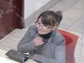 A security camera image showing the suspect in multiple bank fraud incidents in Windsor, Jan. 4-7, 2023.