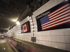 The Canada/U.S. border line inside the Windsor-Detroit tunnel is shown on November 8, 2021.
