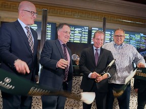 Windsor Mayor Drew Dilkens, left, MPP Brian Masse, Caesars Windsor president Kevin Laforet and Unifor Local 444 president Dave Cassidy cut the ceremonial ribbon at Caesars Windsor's new full-service sportsbook on Wednesday, January 11, 2023.