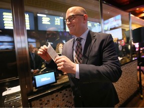 Windsor Mayor Drew Dilkens displays his bet at Caesars Windsor's new full-service sportsbook Wednesday, Jan. 11, 2023.