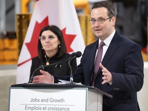 FedDev Ontario Minister Filomena Tassi and MP Irek Kusmierczyk (L — Windsor-Tecumseh) are shown at a press conference on Monday, Jan. 16, 2023, at the CapsCanada plant in Lakeshore.