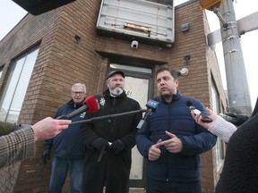Windsor city councillors Jim Morrison, left, Kieran McKenzie and Fabio Costante are shown during a press conference on Friday, January 27, 2023 in front of the approved consumption and treatment services site on Wyandotte Street East.
