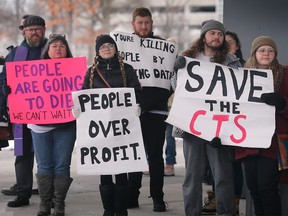 Participants in a rally to support  the approved Consumption and Treatment Services site are shown at Windsor City Hall on Monday, January 30, 2023 before the start of a city council meeting.