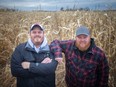 'Celebrating success." Chad Quinlan, left, and Don Quinlan, brothers and owners of Quinlan Farms, are pictured on Dec. 2, 2022. Their farm has garnered an ERCA conservation award.