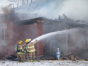 Lakeshore firefighters battle a serious house fire at the corner of Rochester Townline Road and County Road 42, on Thursday, Jan. 26, 2023.