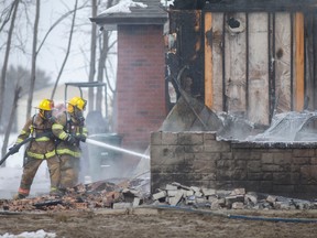 Lakeshore firefighters battle a serious house fire at the corner of Rochester Townline Road and County Road 42, on Thursday, Jan. 26, 2023.