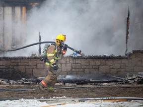 Lakeshore firefighters battle a serious house fire at the corner of Rochester Townline Road and County Road 42, on Thursday, Jan. 26, 2023.