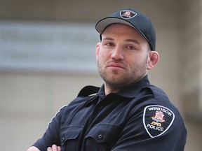 New Windsor police officer and former Olympic wrestler Jordan Steen stands in front of downtown headquarters on Jan. 13, 2023.