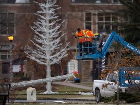 Workers continue taking down the Bright Lights Windsor displays at Jackson Park, on Wednesday, Jan. 18, 2023.