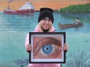 Madi Young, an Amherstburg-based artist displays on Thursday, January 26, 2023, her painting that went viral on TikTok and has sparked commissions for her art worldwide.
