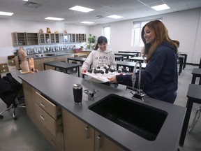 Biology teacher Jeanelle Spratt, left, and principal Amy Lo Faso are shown at the new Catholic Central High School on McDougall Street on Monday, January 9, 2023.