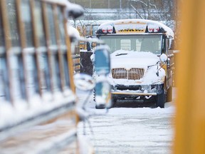 Snow-covered school buses in Windsor are shown in this 2019 file photo.