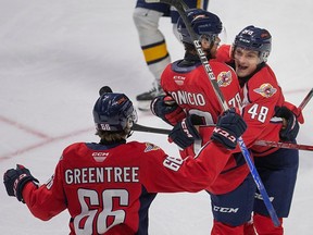 While rookie LIam Greentree, left, is set to return to the Windsor Spitfires' lineup in time for Thursday's playoff opener, defenceman Roddy Dionicio, centre, is set to serve a two-game suspension.