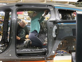 Autoworkers are shown at the Stellantis Canada Windsor Assembly Plant on Tuesday, Jan. 17, 2023.