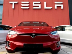 Tesla car and sign.