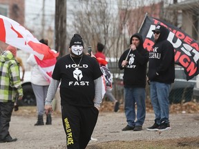 Not everyone was pleased with the prime minister’s presence. Protestors are shown here near the University of Windsor’s Ed Lumley Centre for Engineering on Tuesday during Justin Trudeau’s visit.