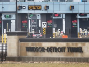 A motorist approaches the Windsor-Detroit Tunnel toll booths in Windsor on Wednesday, January 4, 2023.