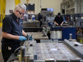 Don Beneteau, a toolmaker at Cavalier Tools, works on the plant floor on Friday, Jan. 20, 2023.