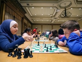 Rokaya Bazzi, left, from Louise-Charron Elementary School competes against Easton Philpott from Lakeshore Discovery Public School during the 21st Annual Windsor Chess Challenge on Tuesday, February 26, 2019, at the Ciociaro Club in Windsor, ON. The event attracted over 1,400 elementary school students from over 80 schools and is the largest of its kind in Southwestern Ontario.