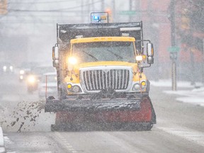 A snow plow at work on Windsor streets in February 2022.