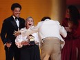 Harry Styles reacts as he accepts the Album Of The Year award for "Harry's House" during the 65th Annual Grammy Awards in Los Angeles, Sunday, Feb. 5, 2023.