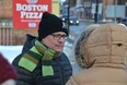Ontario Green Party Leader Mike Schreiner talks to a participant at a rally in Owen Sound on Tuesday, Jan. 31, 2023.
