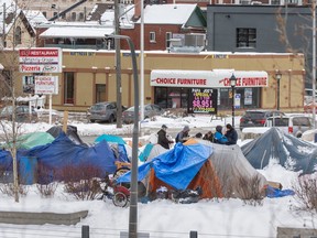 A homeless encampment in Kitchener, Ont., at the corner of Victoria and Weber Sts. on Monday, Jan. 31, 2023.