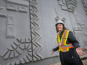 Artist Sara Graham takes a look at her finished work on the maintenance building at the Canadian Port of Entry for the Gordie Howe International Bridge, on Feb. 15, 2023.