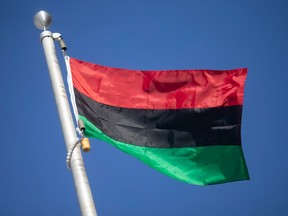 The Pan-African flag is raised at a ceremony to honour Black History Month at the University of Windsor, on Wednesday, Feb. 1, 2023.